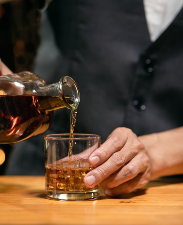 Pouring spirits and liquor at a bar